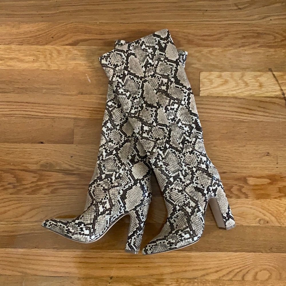 Snakeskin knee-high boot